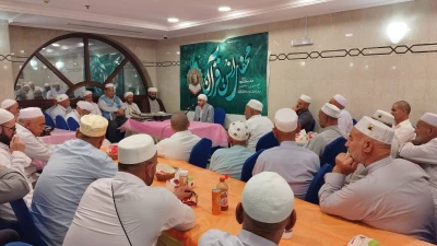 گزارش تصویری/  محفل انس با قرآن در مدینه با حضور زائران استان گلستان